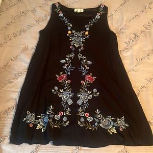 Black, floral, size medium, sleeveless dress.